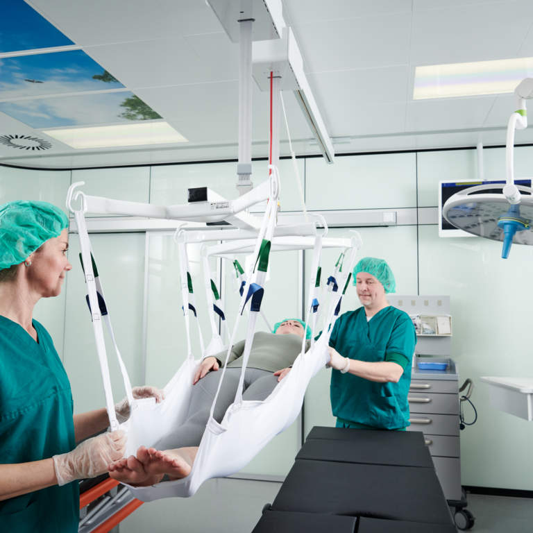 Simplify repositioning of patients during surgeries with ceiling hoist technology.