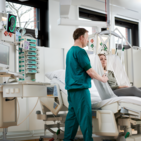 A rail system overhead enables smooth and efficient patient transfers in the operating theatre
