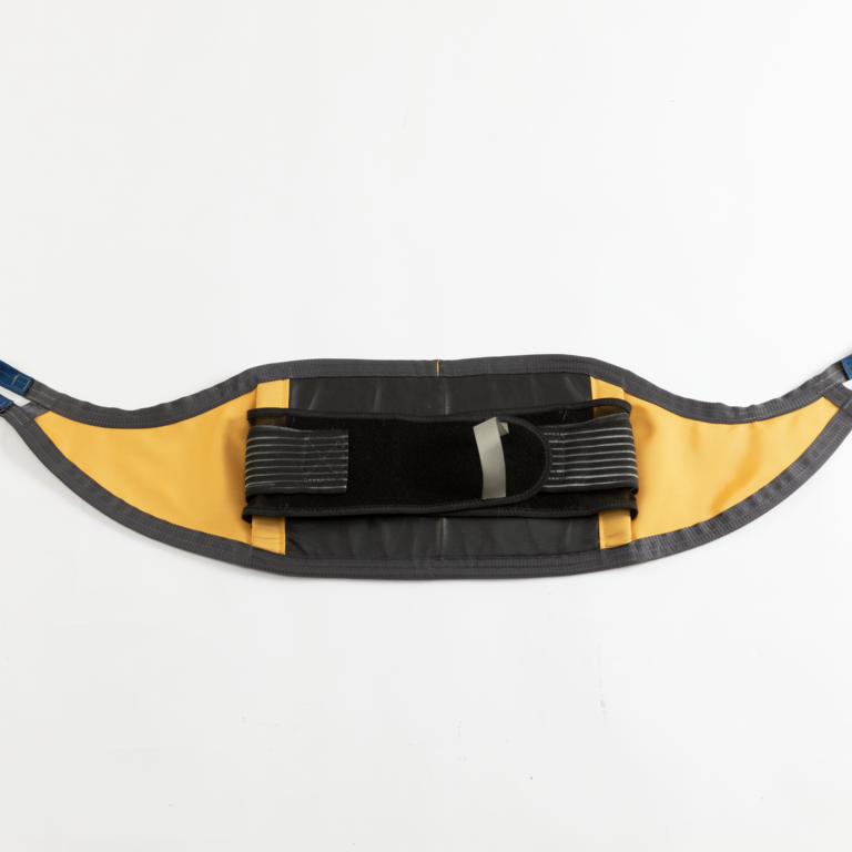 A Guldmann Standing Sling for use with the GLS5.2 Active lifter, designed to provide support during standing and transfers, with an elastic support strap