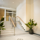 Stepless SLP model C platformlift die terug verandert in trap bij T-House, Stockholm