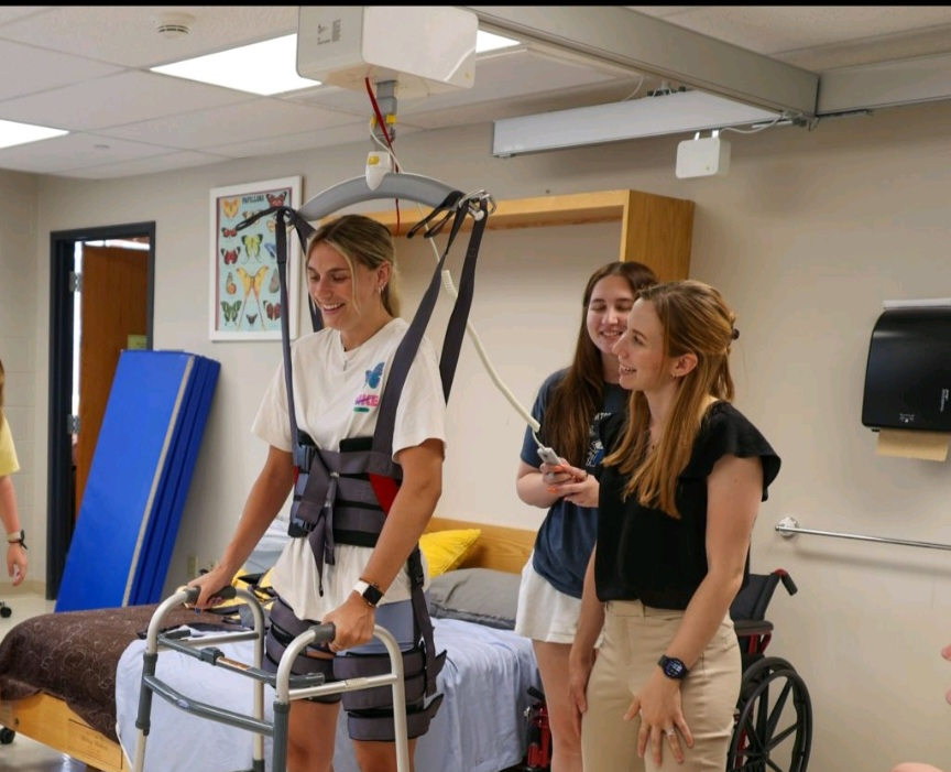 Guldmann GH3+ ceiling lift with Trainer Module installed at Elizabethtown College, enabling occupational therapy students to practice safe patient handling techniques.